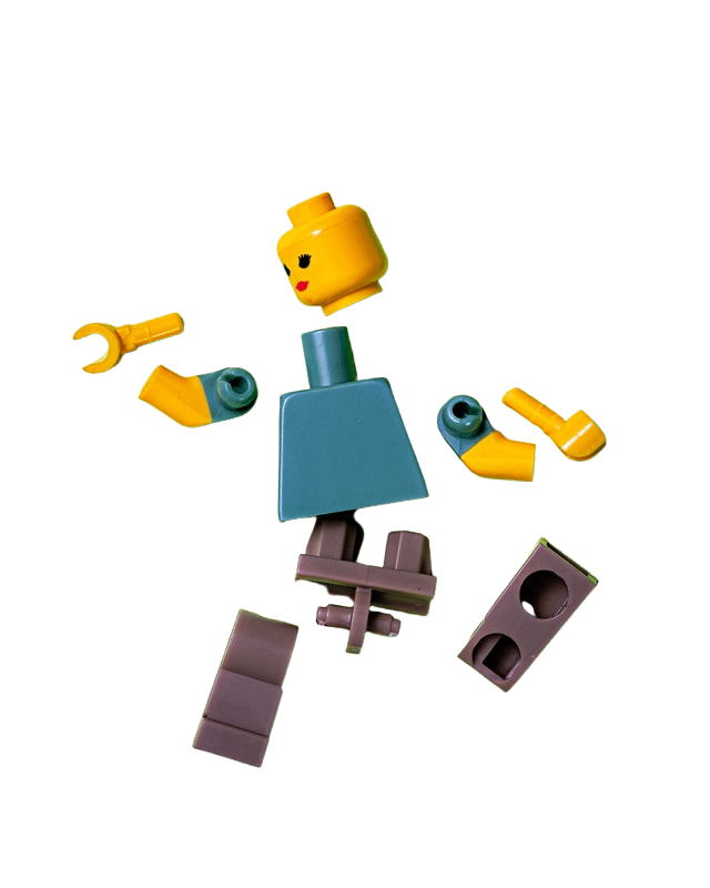 Picture of lego woman with each body part attached as if they broke apart.